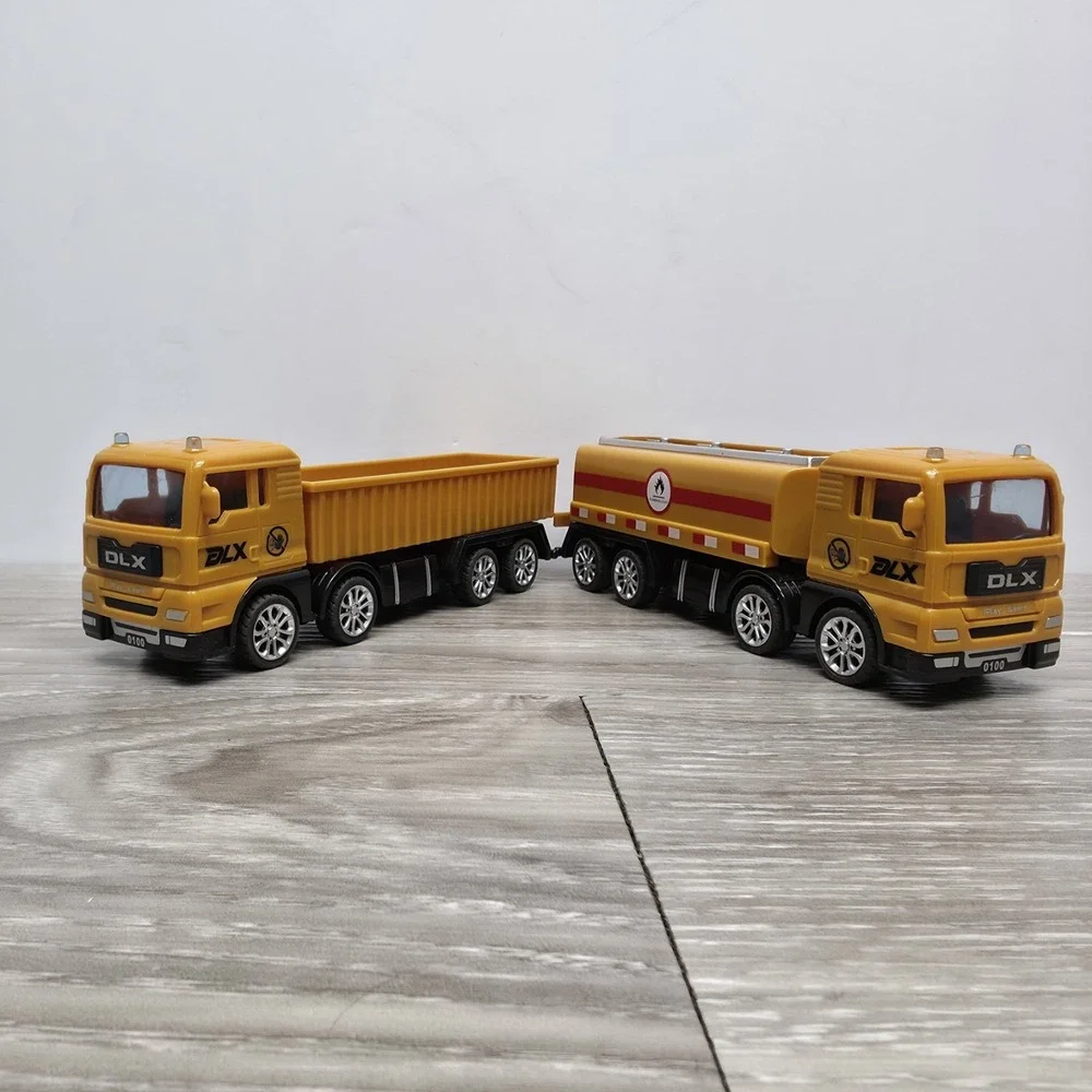 DLX Builder equipment/trucks lot - 2 Hauling Trucks